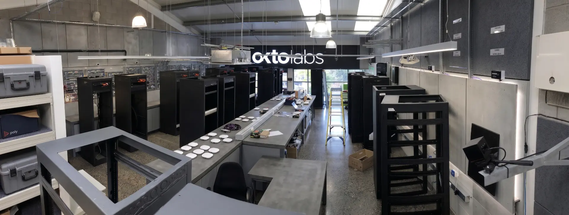 OKTOLabs workshop with racks staged for offsite commissioning