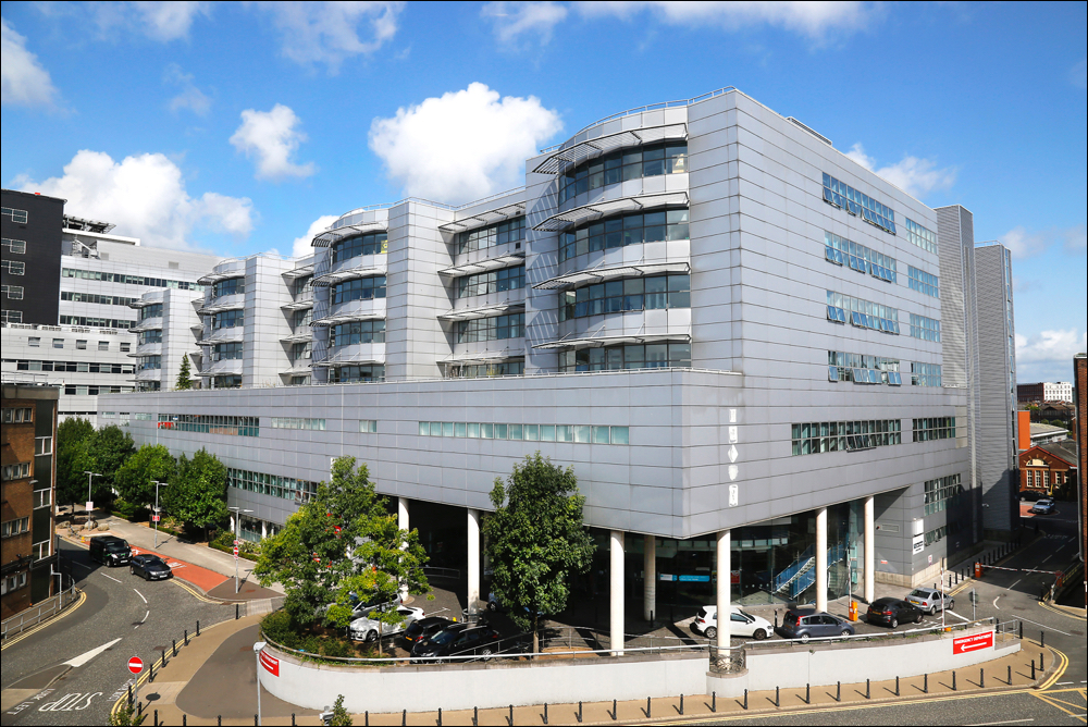 A modern hospital building with an Emergency Department