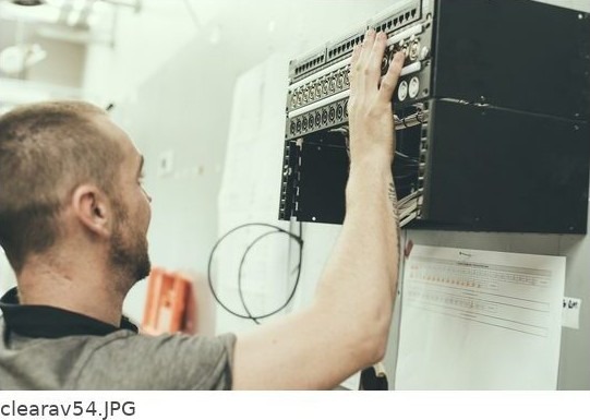 Engineer commissioning a control panel
