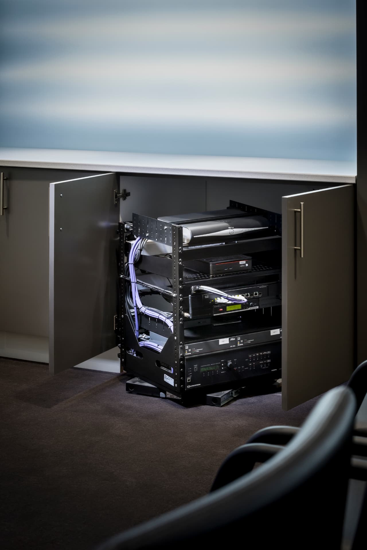 AV rack concealed inside joinery